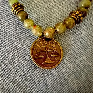 Bloodstone bracelet with bronze Libra charm. Natural agate beads.